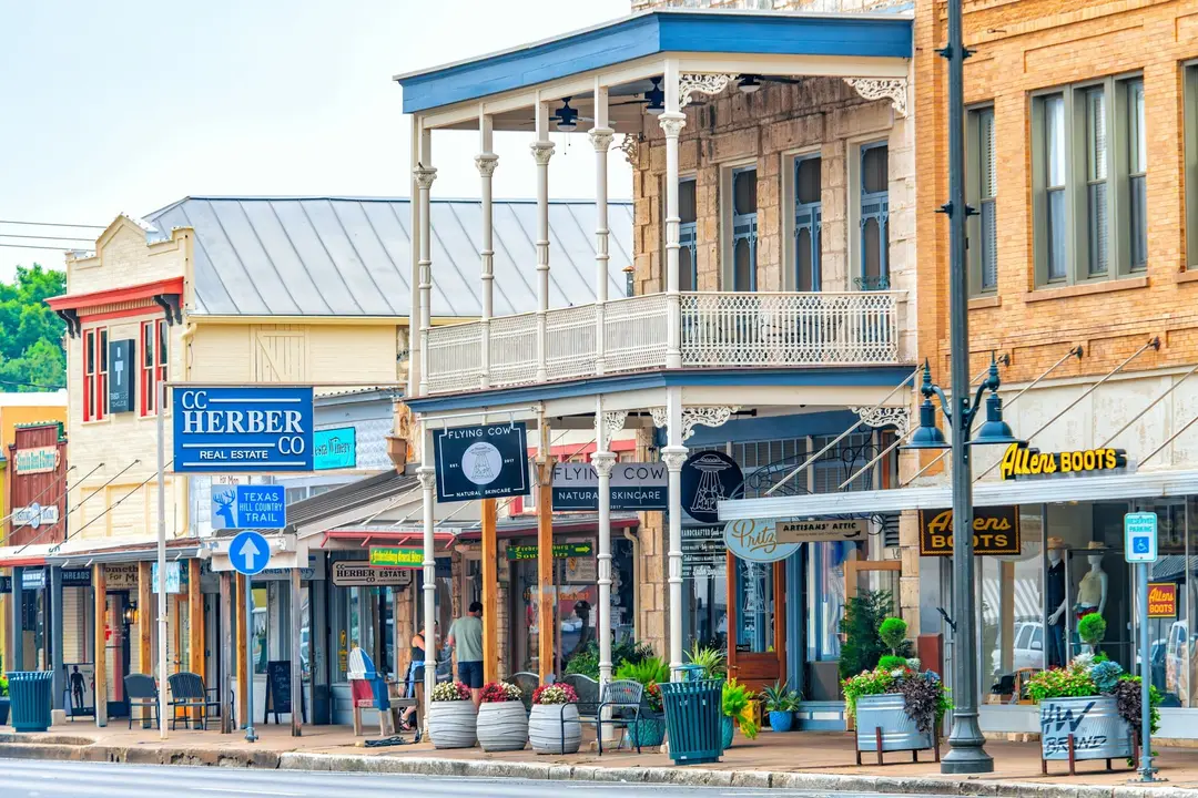 Row of painted historic storefronts on a small-town main street